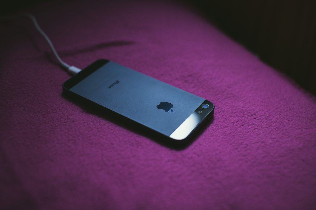 Charging iPhone 5 - free stock photo
