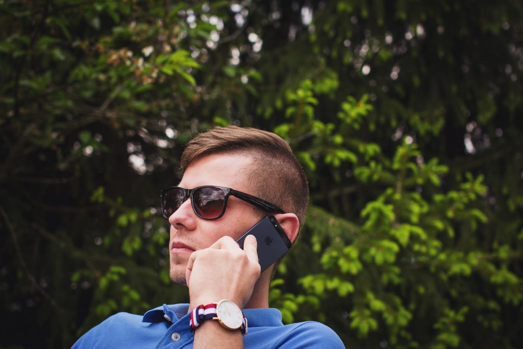 young_man_talking_on_the_phone-1024x683.