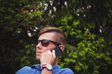 Young man talking on the phone - free stock photo
