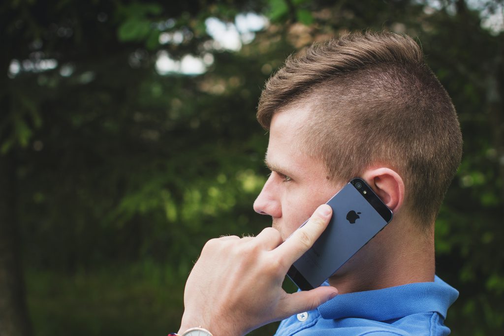 Young man talking on the phone 3 - free stock photo