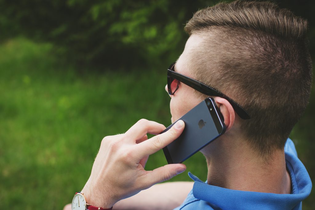 Young man talking on the phone 4 - free stock photo