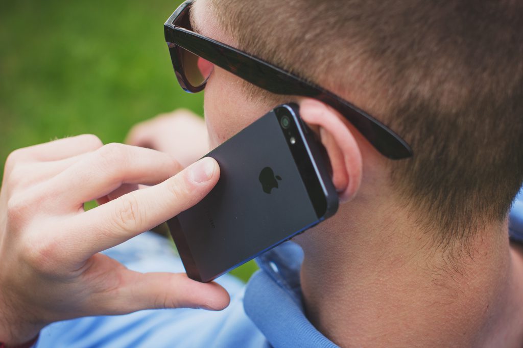 Young man talking on the phone 5 - free stock photo