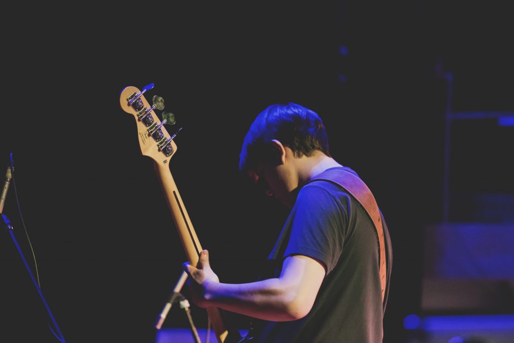 Man playing bass guitar - free stock photo