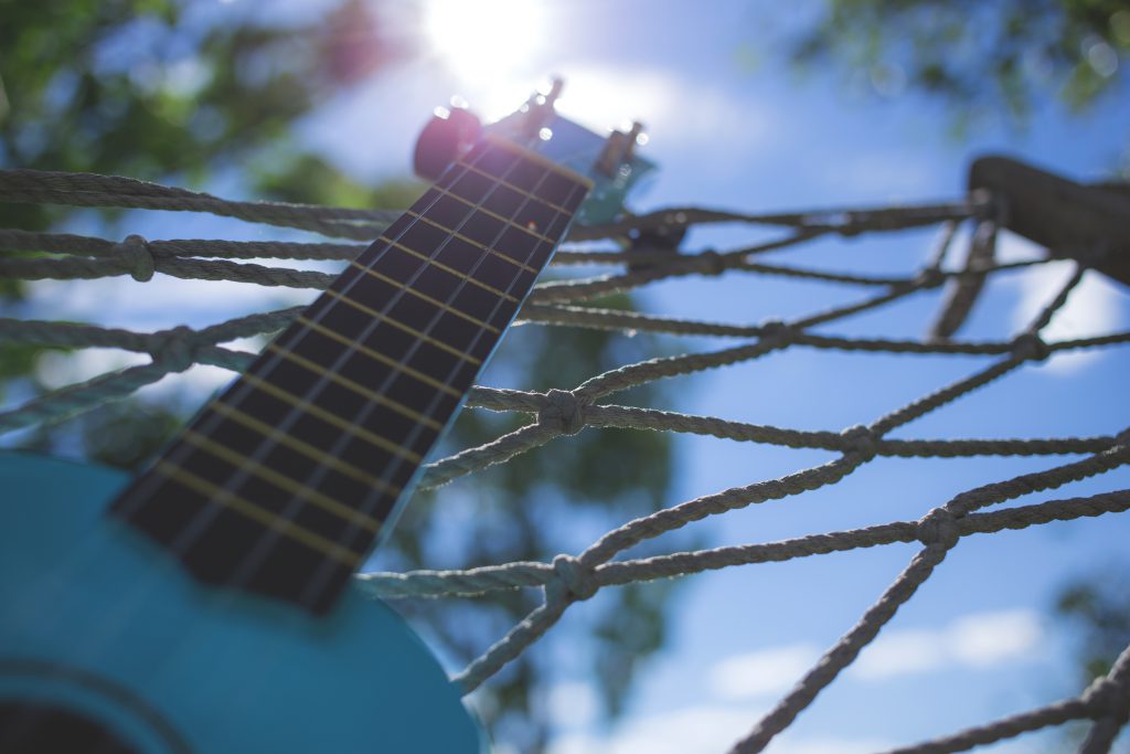 Ukulele on a hammock - free stock photo