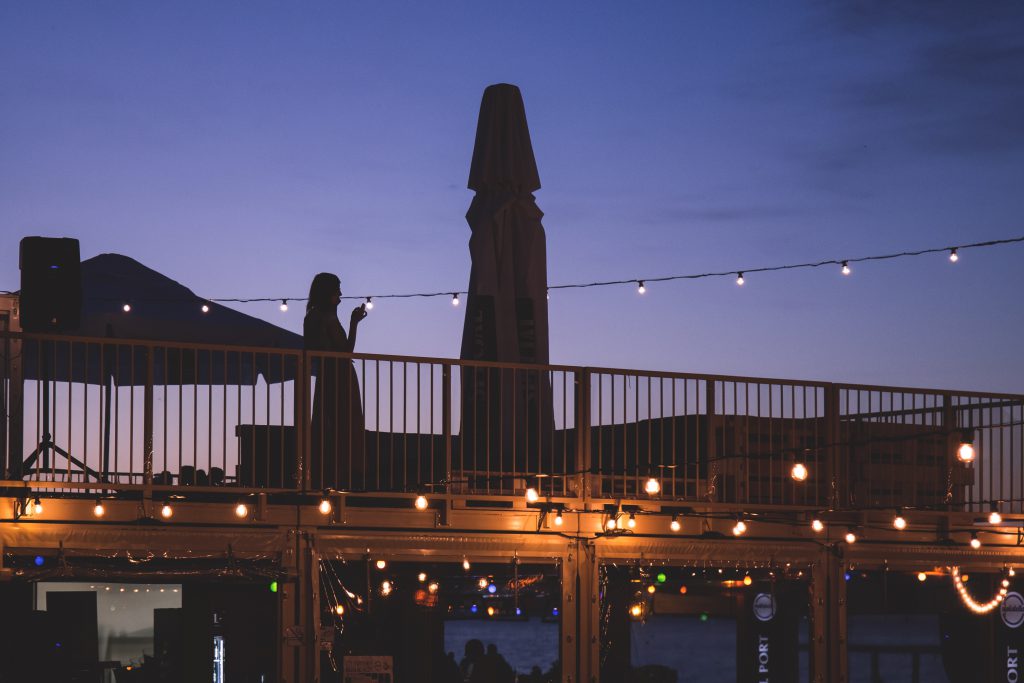 Woman on the balcony - free stock photo