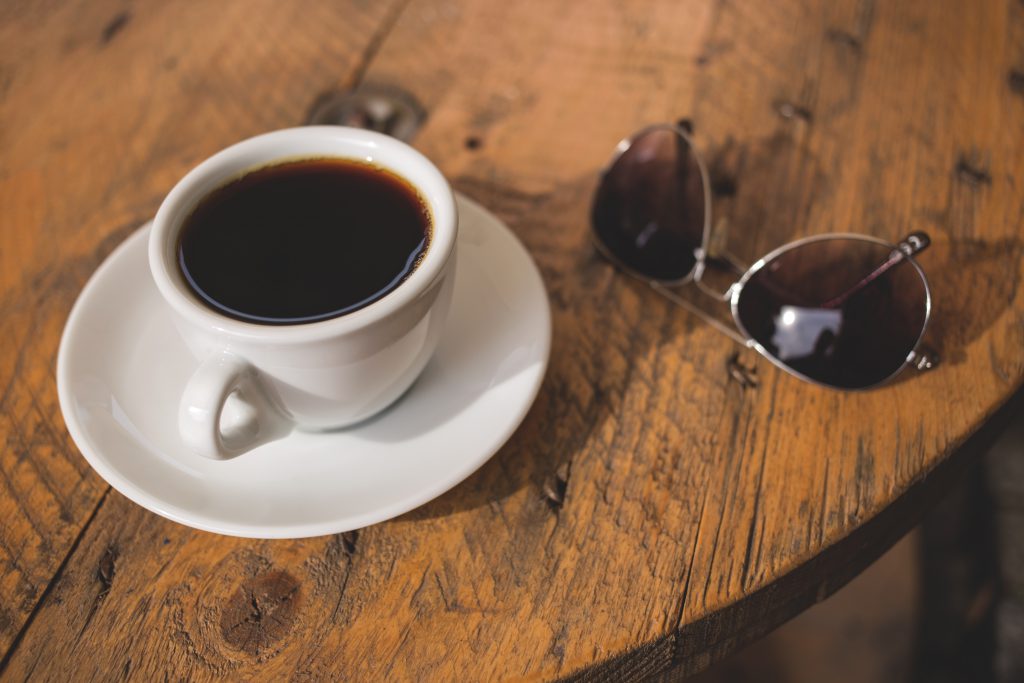 Black coffee and sunglasses - free stock photo