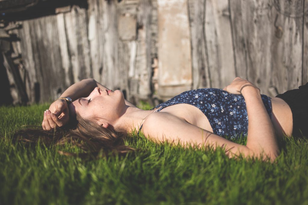 Girl laying on grass - free stock photo