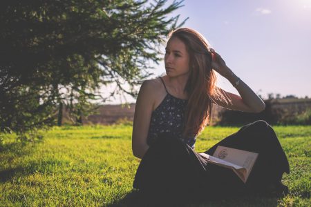 Girl sitting on the grass - free stock photo