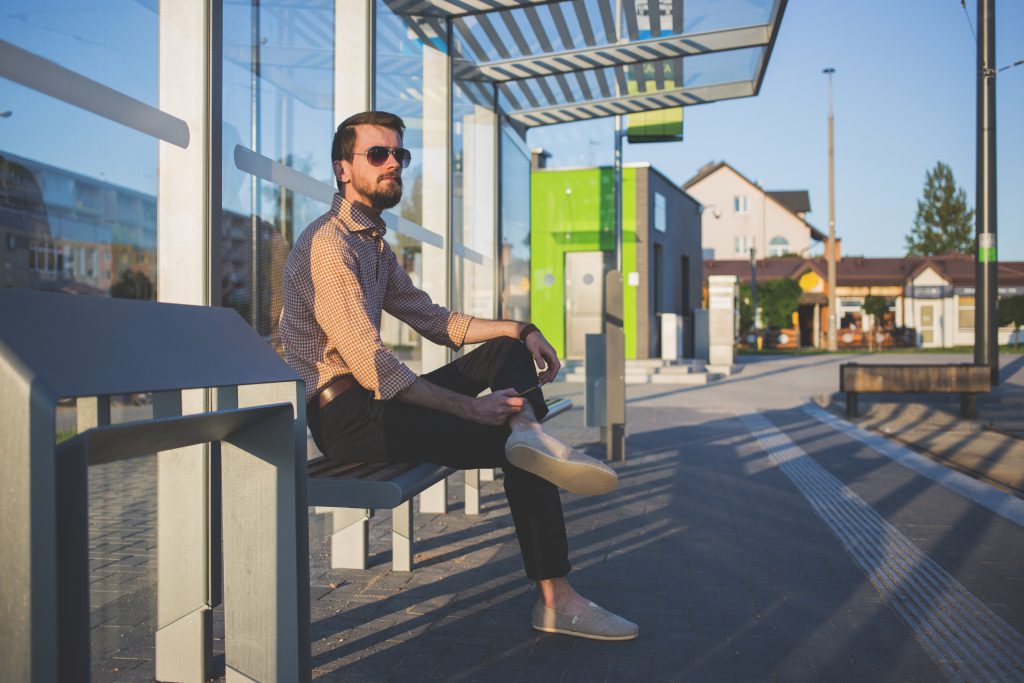 Man at tram stop - free stock photo