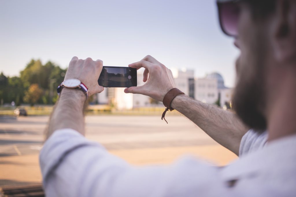 Man taking a picture - free stock photo