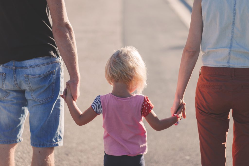 Family holding hands - free stock photo