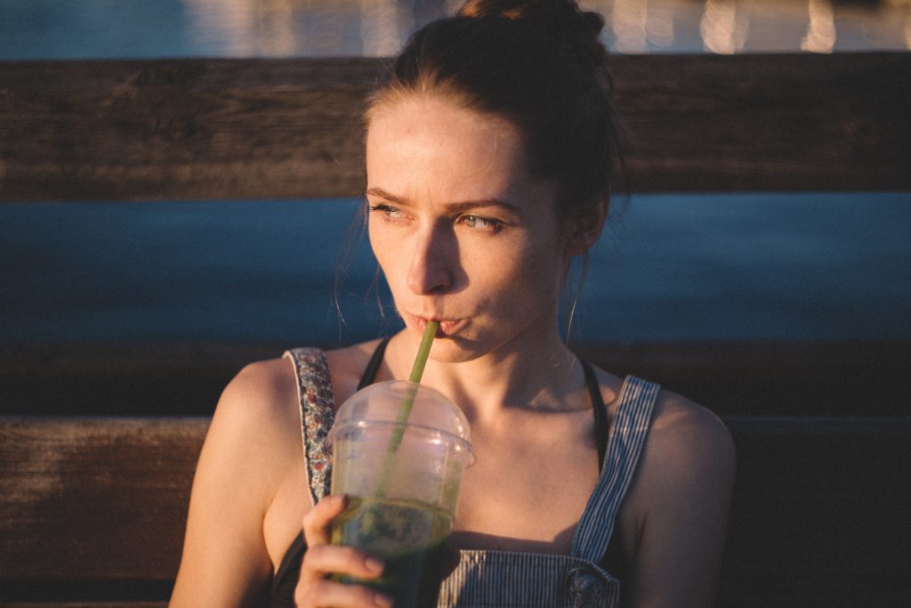 Girl drinking smoothie - free stock photo