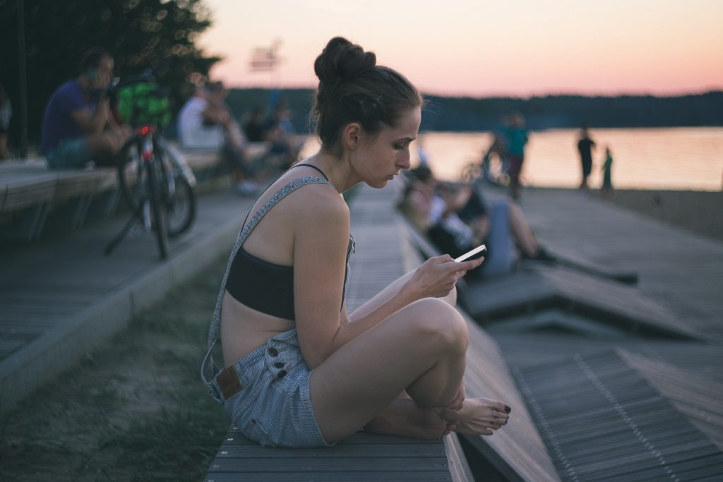 Girl with a phone - free stock photo