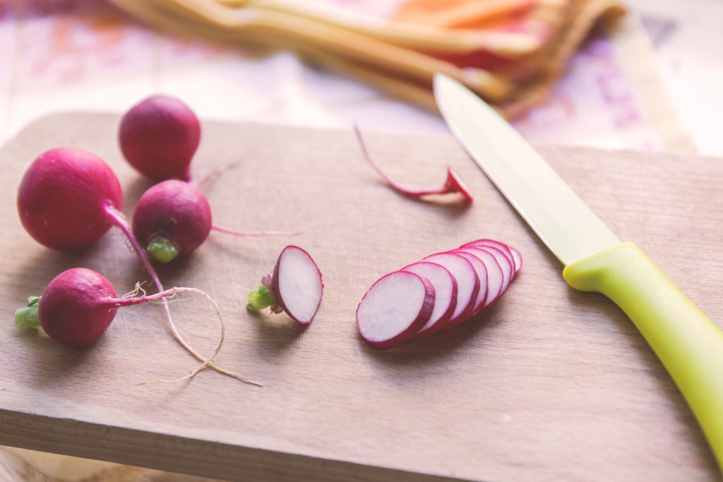 Radish on a cutting board - free stock photo