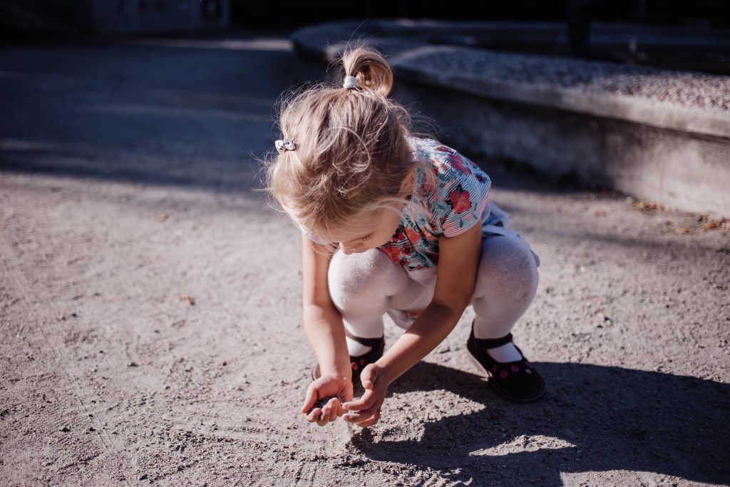 Girl playing with sand - free stock photo