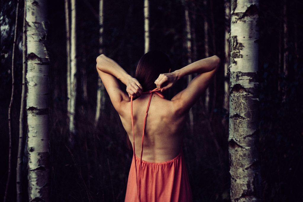 Backless dress in the woods - free stock photo