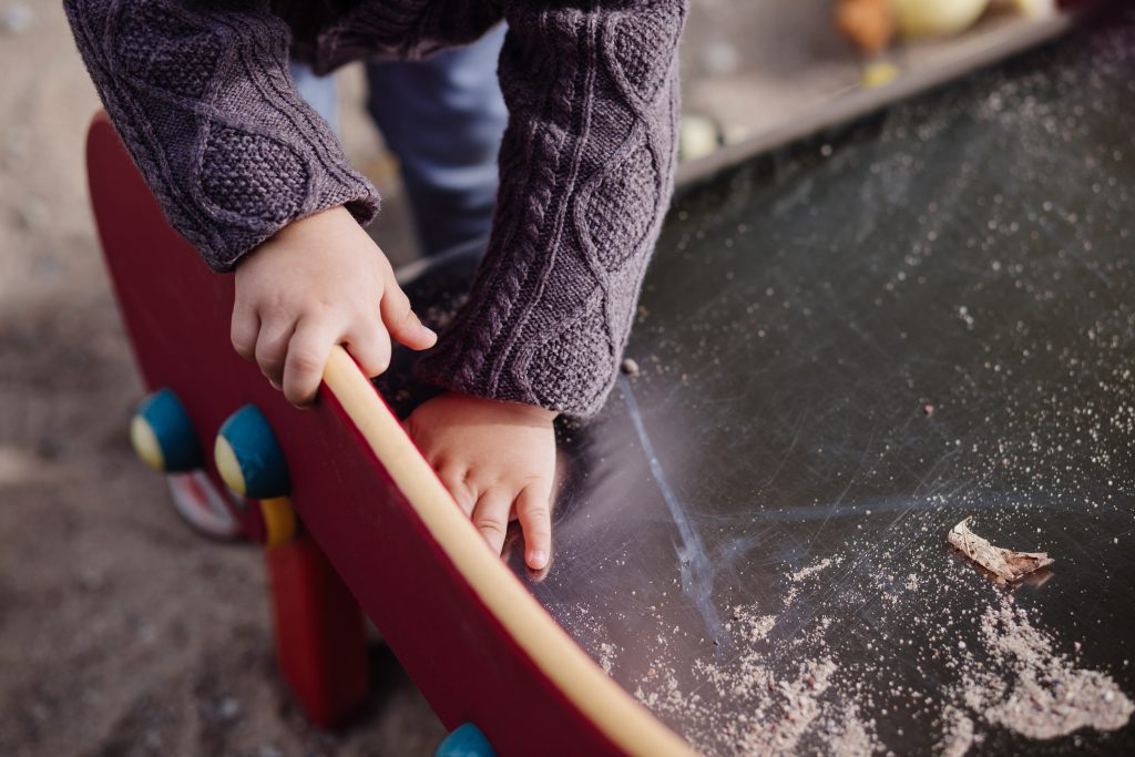 Child cleaning the slide - free stock photo