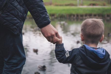 Dad and son holding hands - free stock photo