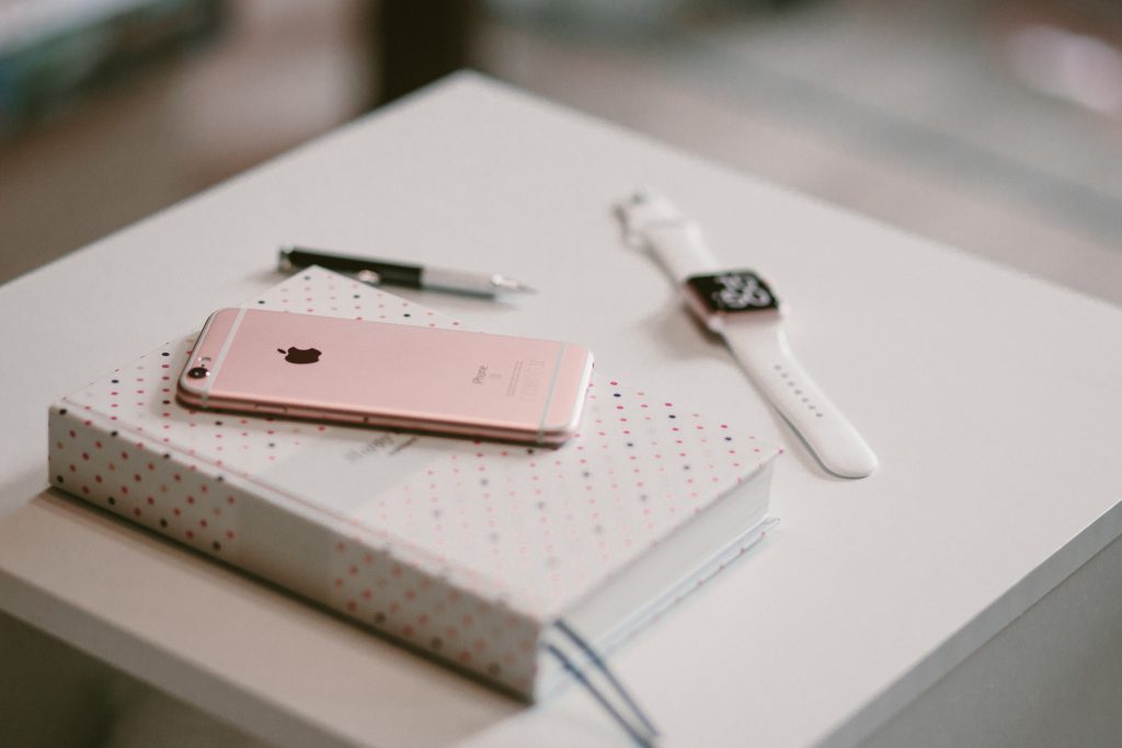 iPhone, iWatch and planner - free stock photo