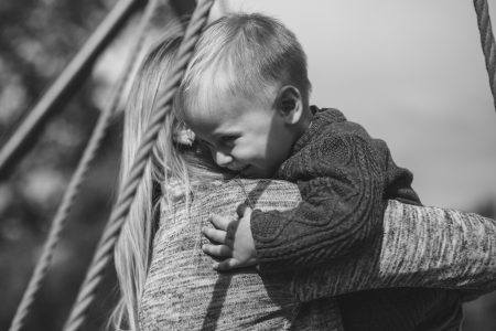 Mom and son hugging - free stock photo