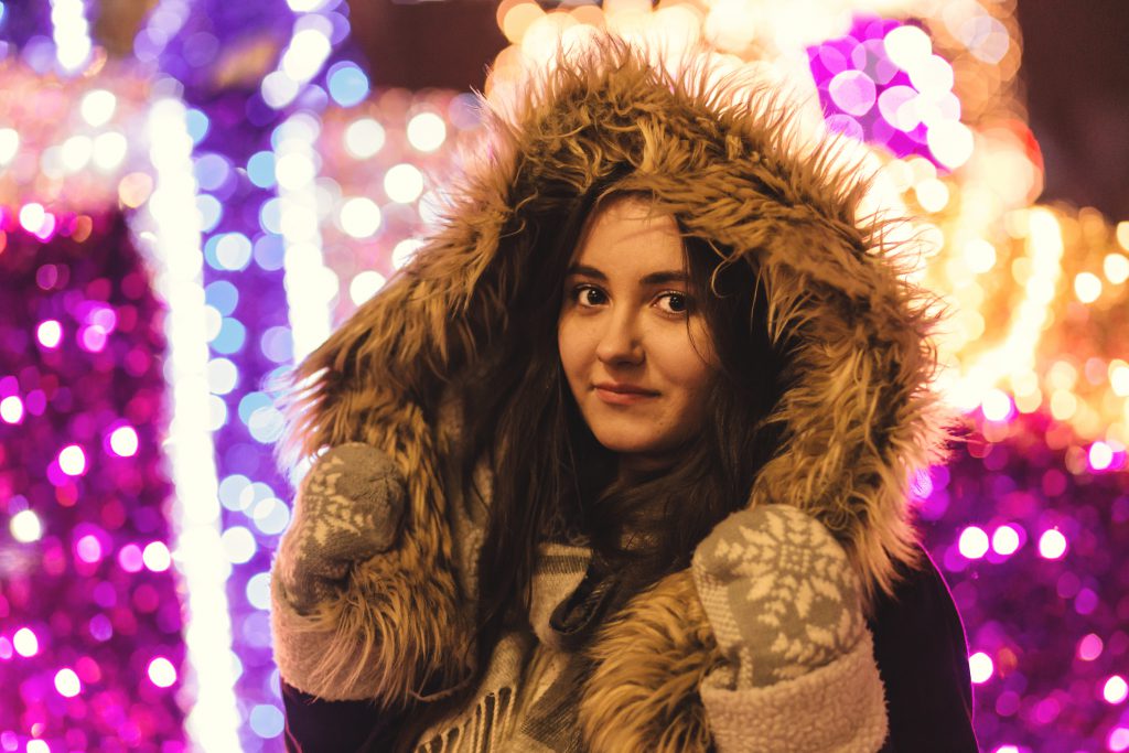 christmas lights and hooded girl