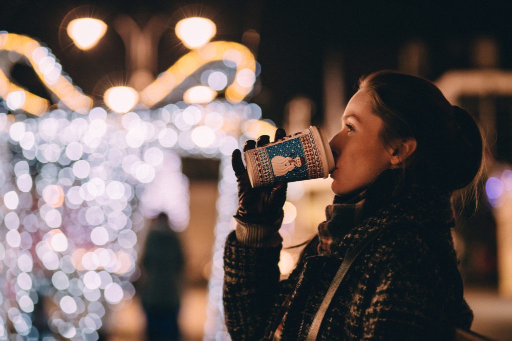 Girl drinking coffee in winter - free stock photo