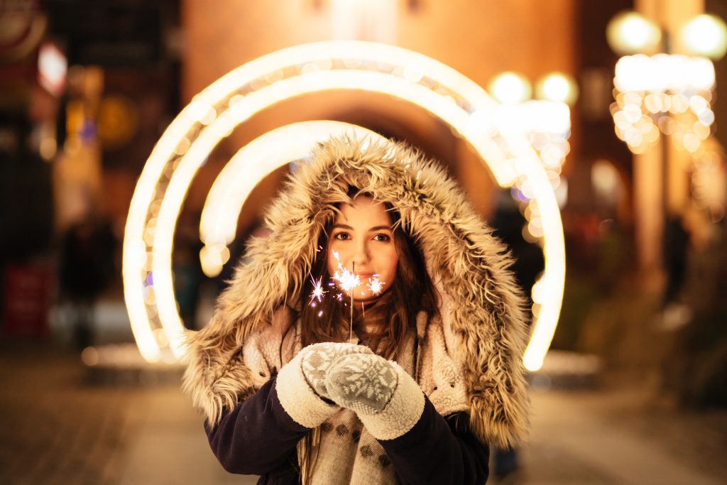 Girl holding a sparkler - free stock photo