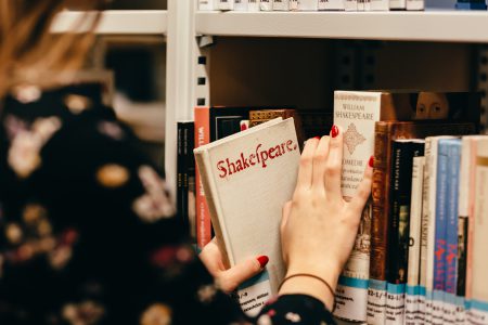 Girl in a library - free stock photo