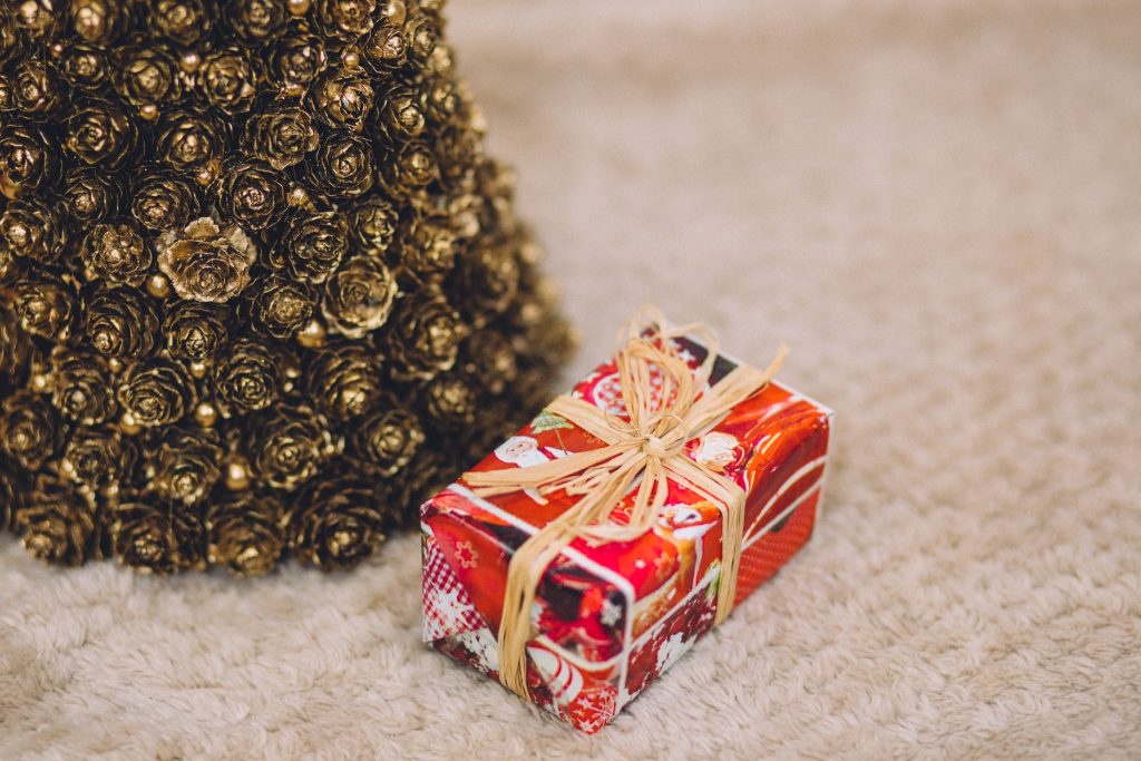 Gold Christmas tree and present - free stock photo