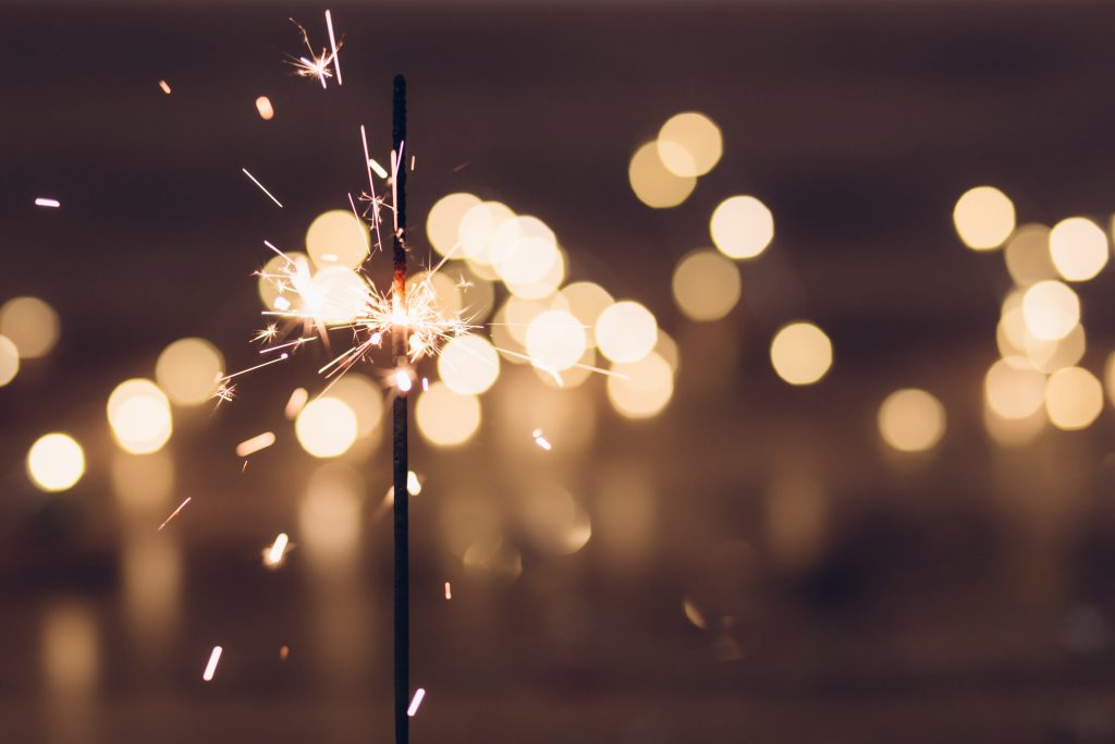 Sparkler and bokeh - free stock photo