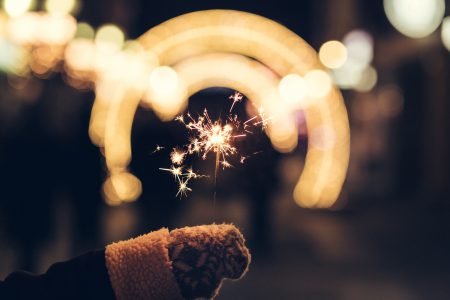 Sparkler and a wollen glove - free stock photo