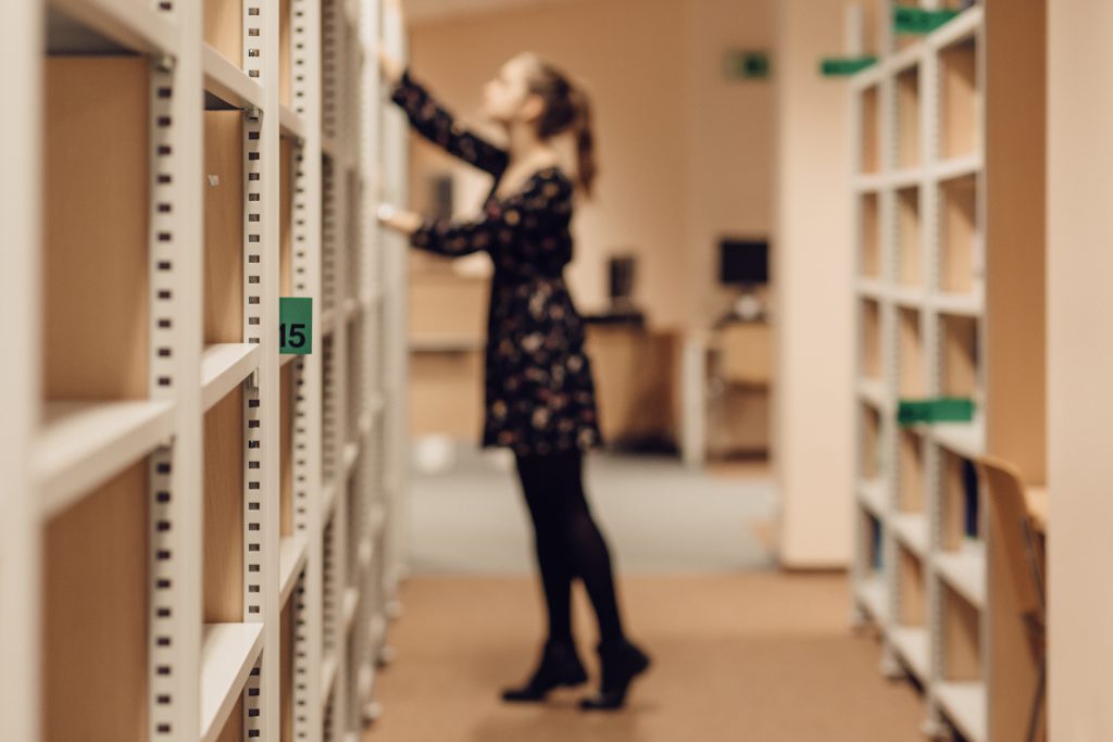 Girl in a library 3 - free stock photo