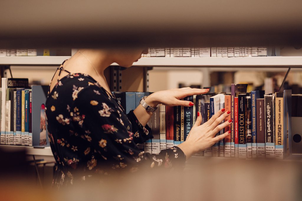 Girl in a library 4 - free stock photo