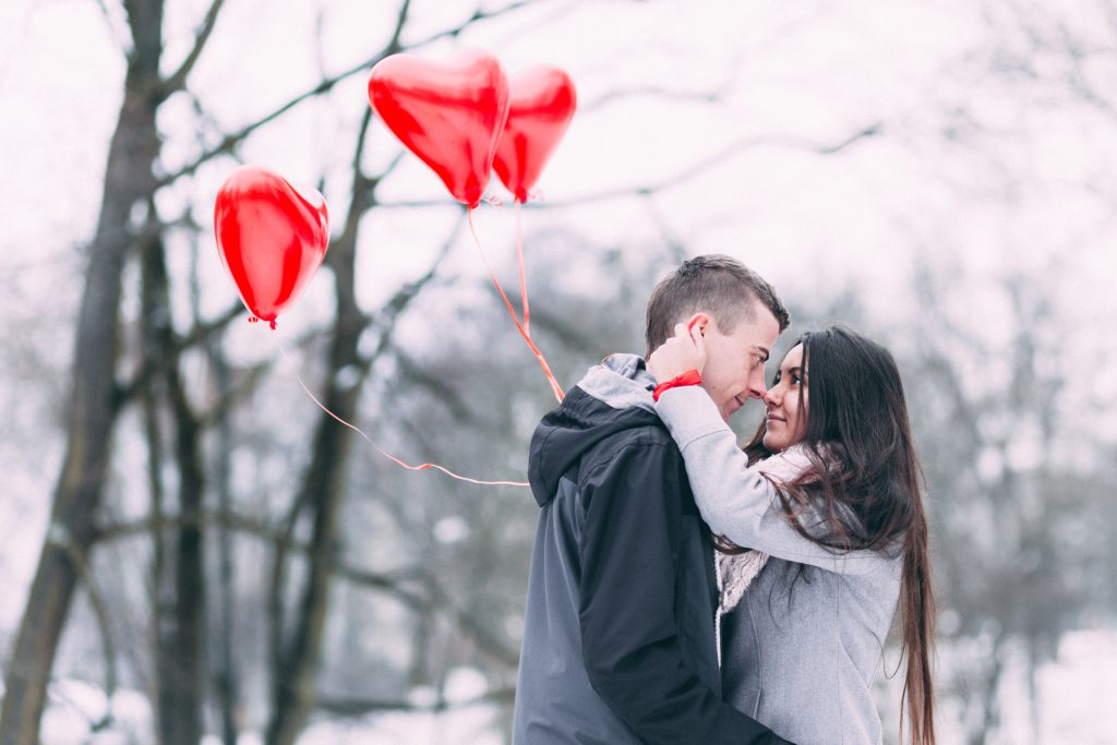A couple with heart shape baloons 4 - free stock photo