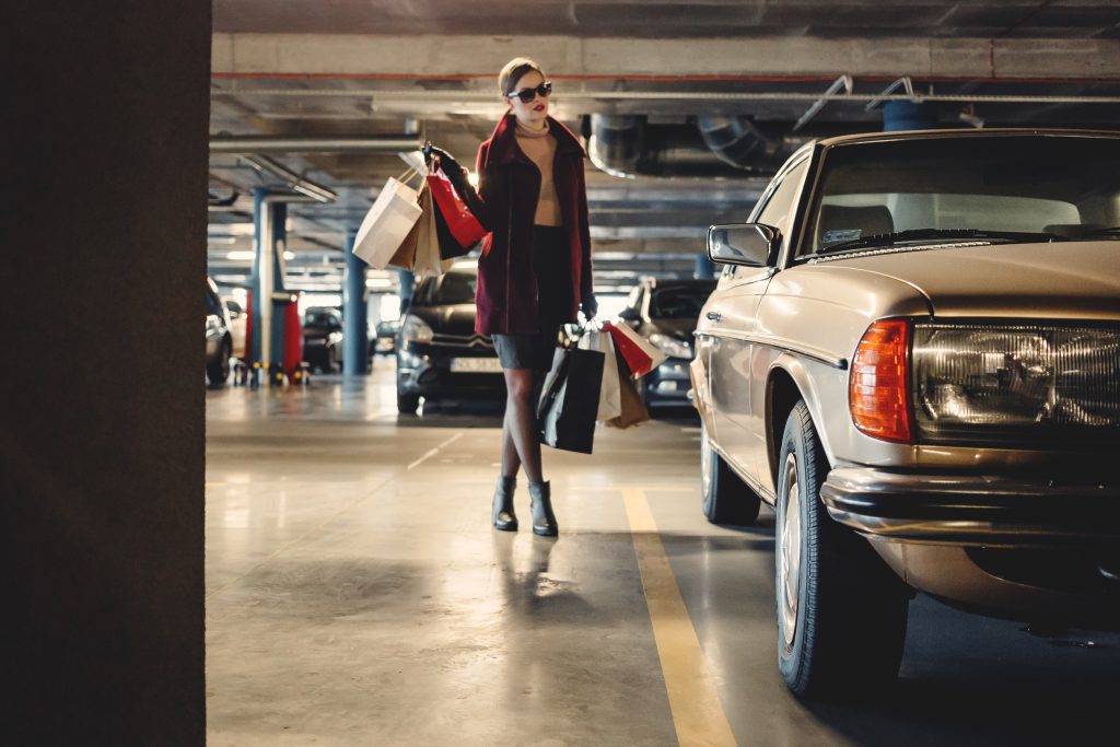 Shopping freak in the parking lot - free stock photo