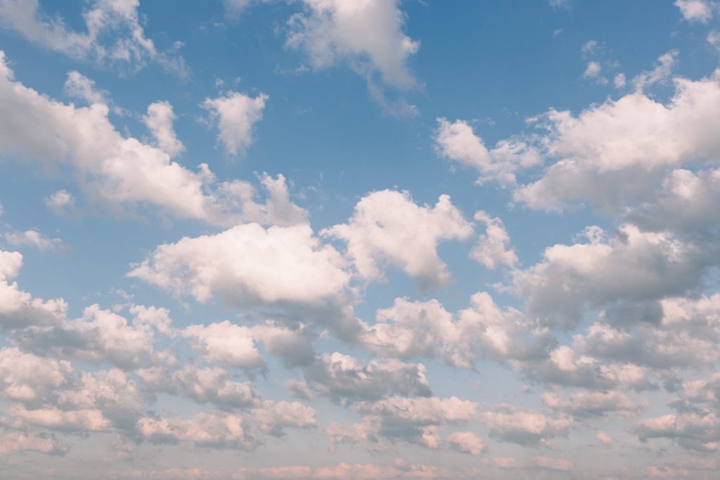 Midday white clouds in the sky - free stock photo