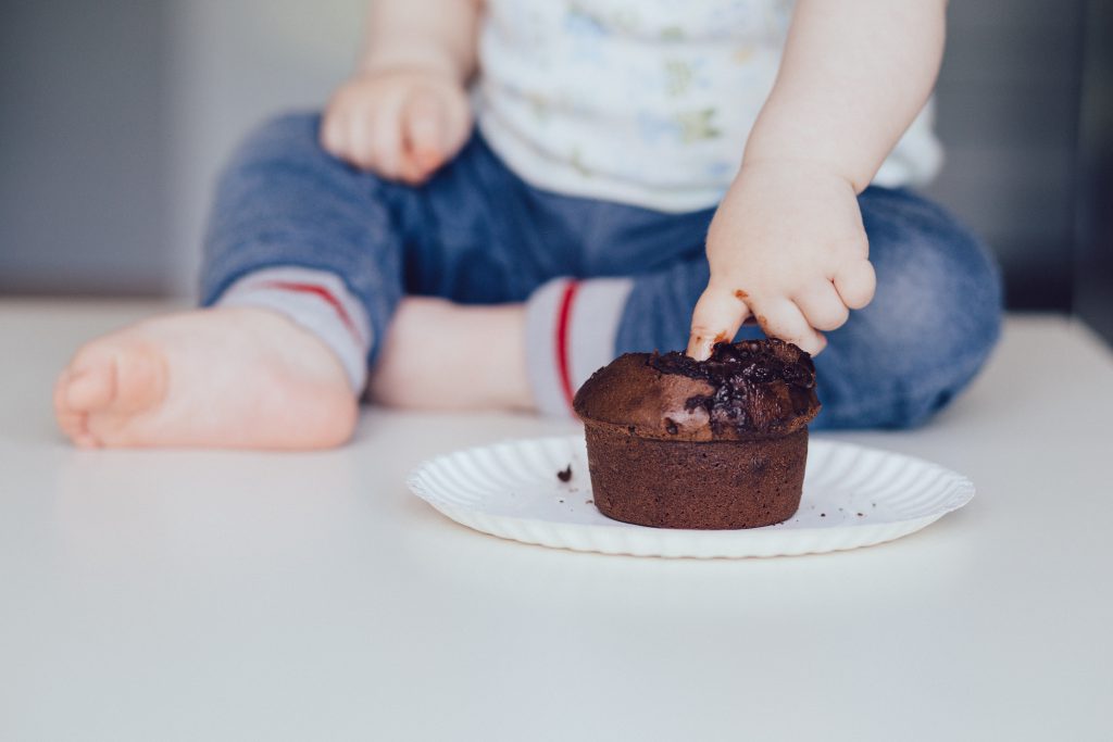 Baby eating muffin 2 - free stock photo
