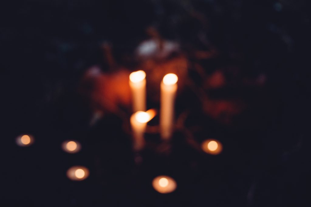 Halloween candles and pumpkins blur - free stock photo