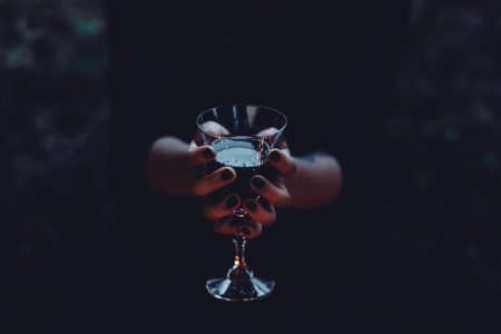 A witch holding a glass of wine 2 - free stock photo