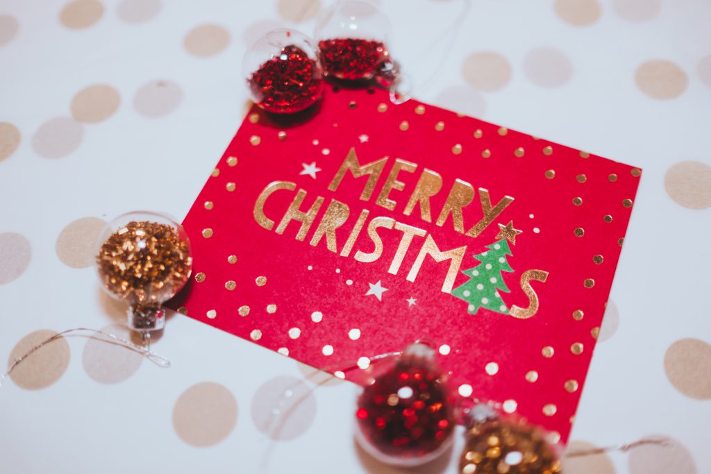 Christmas card and mini baubles - free stock photo