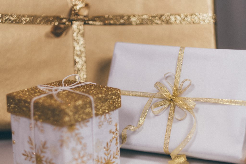 Christmas gifts in gold - free stock photo