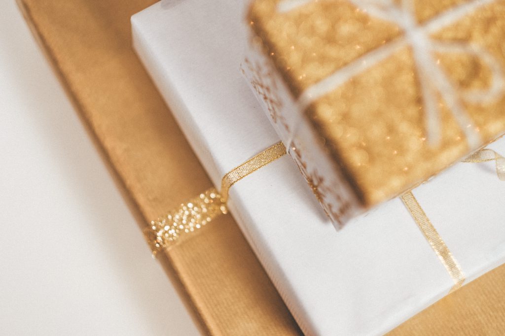 Gold Christmas gifts pile - free stock photo