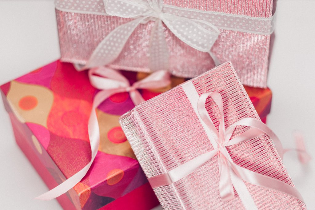 Pink Christmas gifts pile - free stock photo