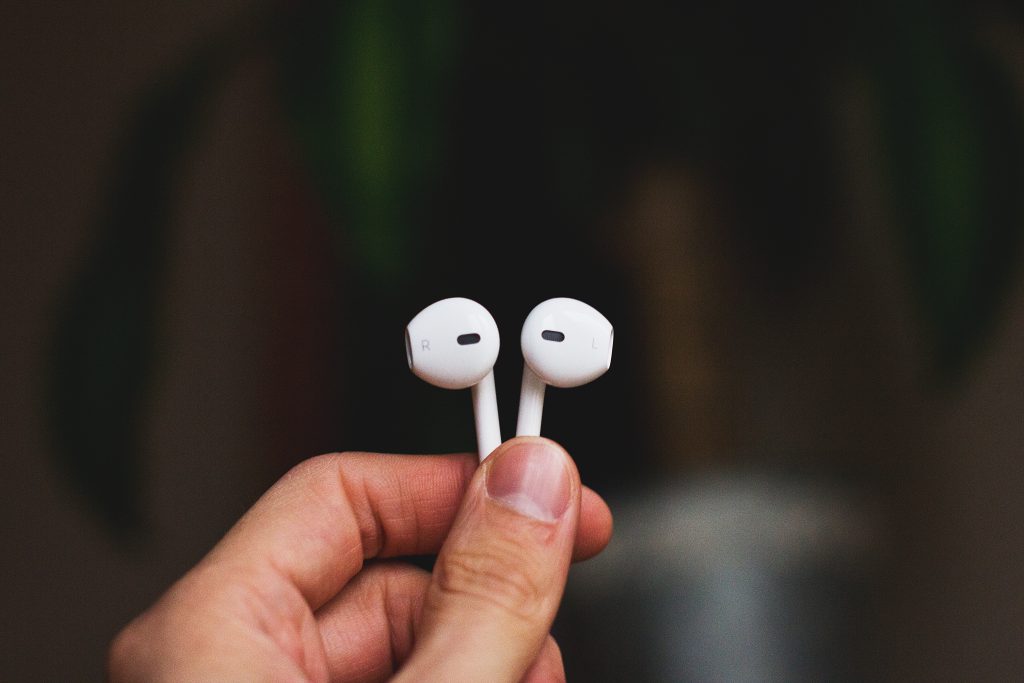 iPhone headphones in a male hand 2 - free stock photo