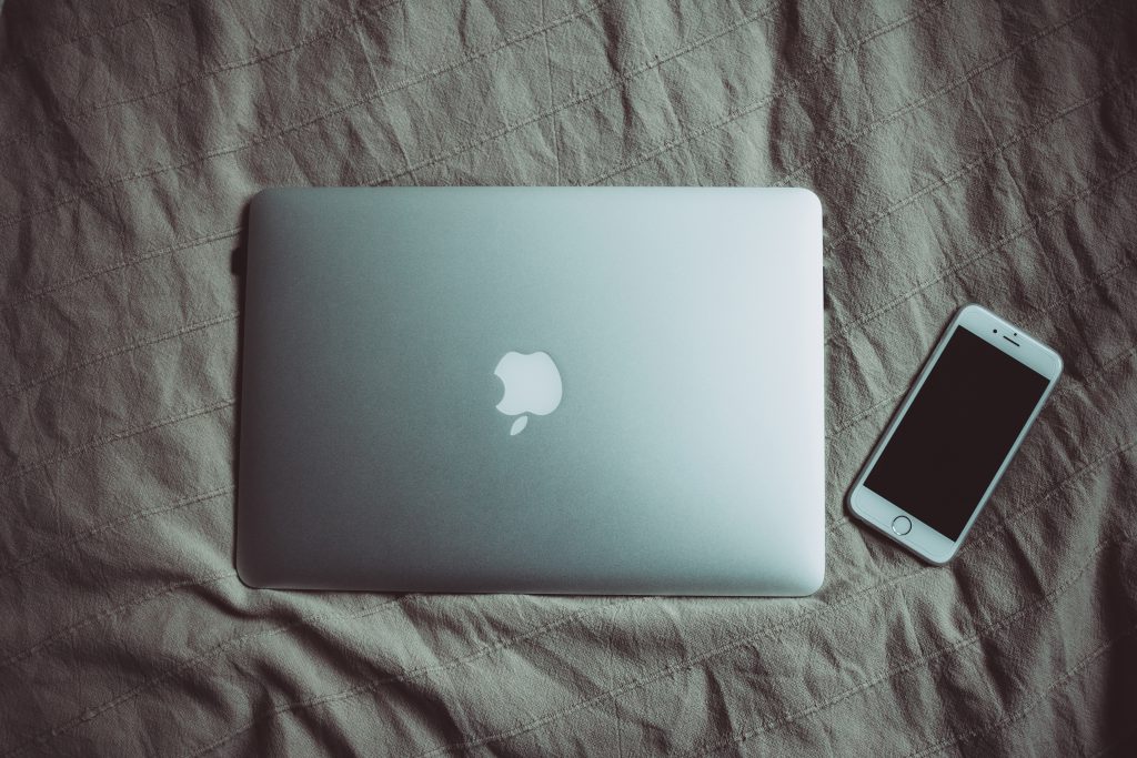 macbook and iphone on bed 1024x683 - Does Online Privacy Typically Make You're Feeling Stupid?