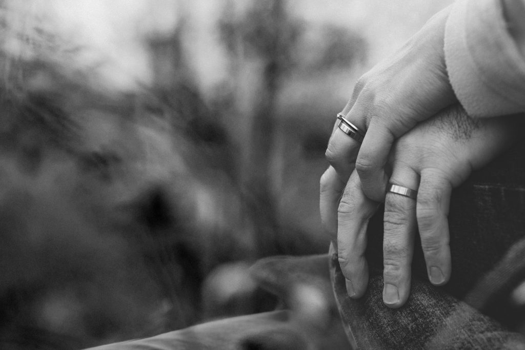 Married couple holding hands - free stock photo