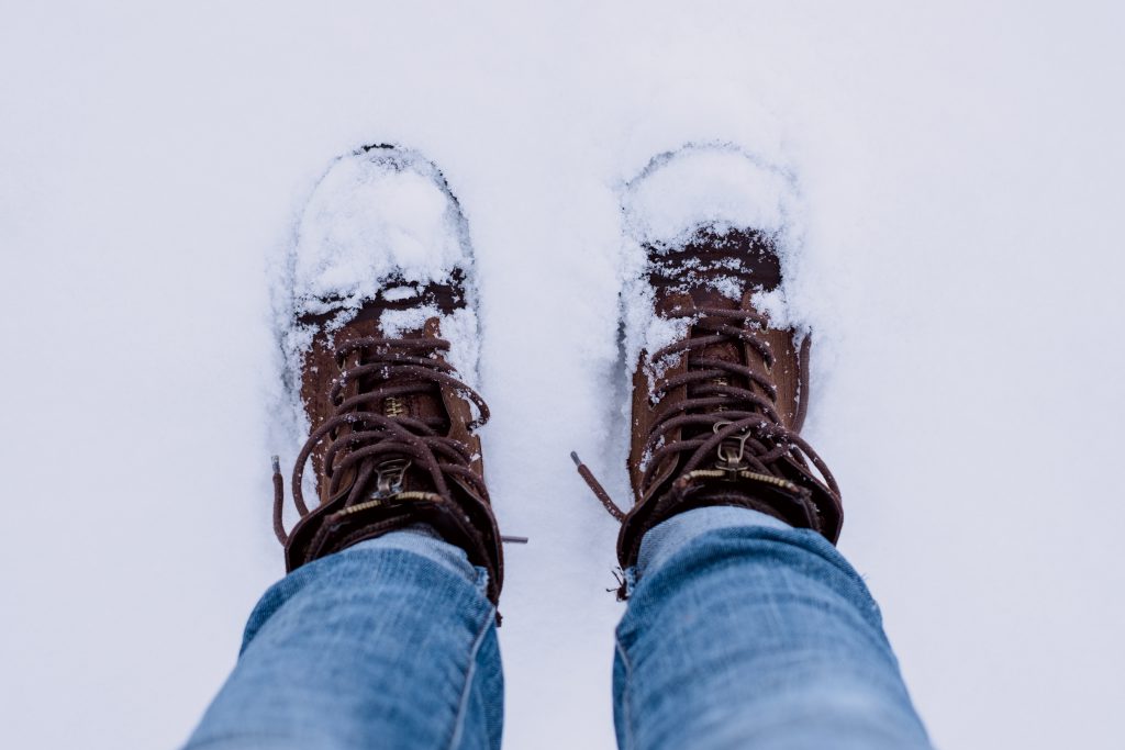 Snow covered shoes - free stock photo