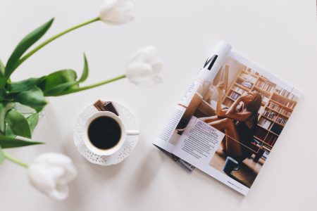 Tulips, cup of coffee and a magazine - free stock photo