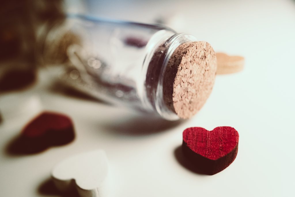 Message in a bottle and wooden hearts 2 - free stock photo