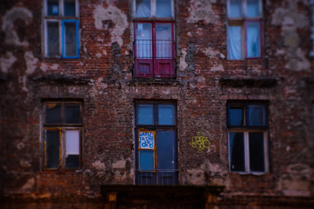 Old red brick tenement house - free stock photo